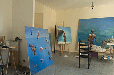 Shelf od paintings in Studio